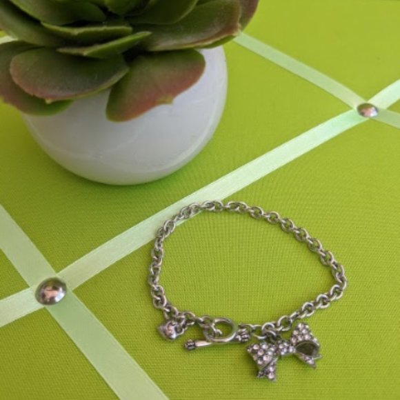 Juicy Couture Silvertone Zircon Bow Charm Bracelet - Picture 2 of 6